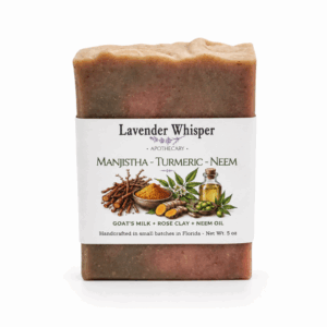 Handcrafted Manjistha Turmeric Neem artisan soap bar with botanical sleeve featuring Ayurvedic ingredients.