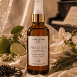 Prelude Linen Room & Car Spray handcrafted by Lavender Whisper featuring bergamot, black tea, cypress and cashmere in an amber glass bottle.